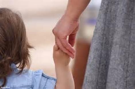 Mom and daughter holding hands