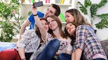 Teens taking a selfie